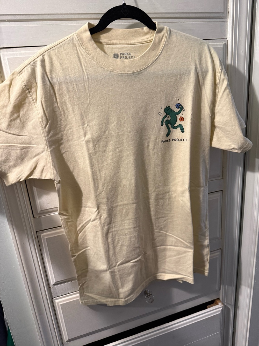 Parks Project Cream Short-Sleeve Tee with Green Mascot Graphic